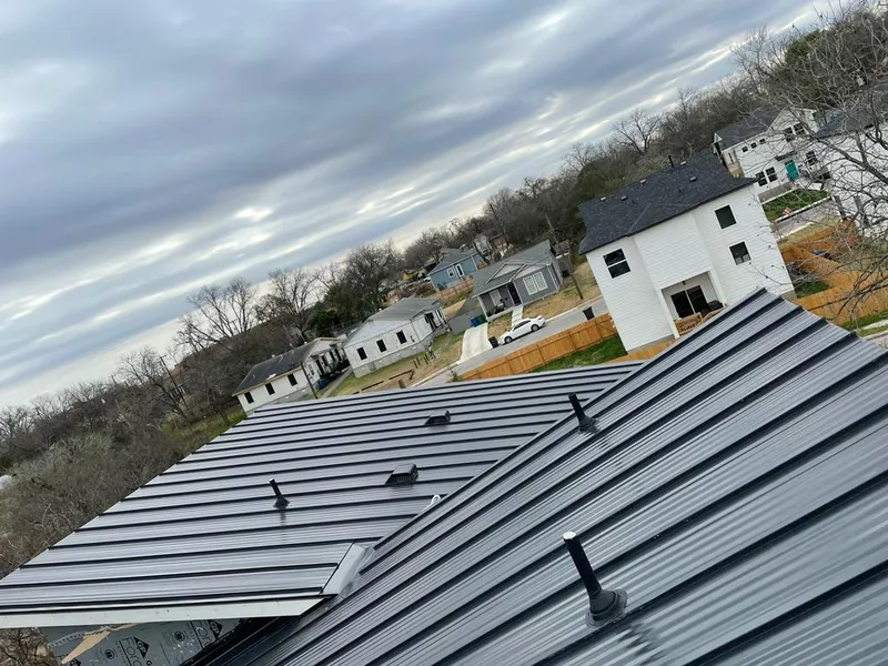 Standing seam metal roof panels with vents for Skylight Repair in Dearborn Heights